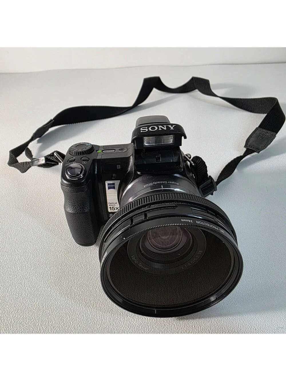 Sony Cyber-shot DSC-H9 8.1MP Digital Camera Bundle - Black, Tube, Filter, Card